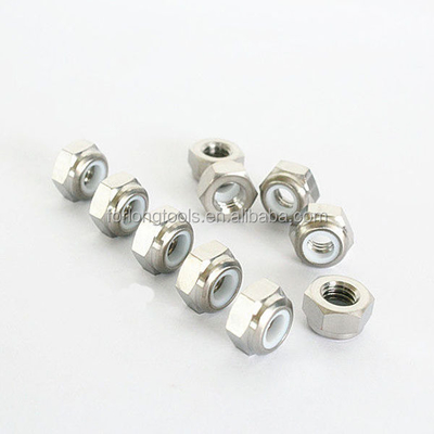 Titane alliage M6x1.25 écrous de fermeture de la tête de la bride hexagonale avec finition universelle et insert en nylon répondant aux exigences de la norme DIN